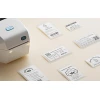 Термопринтер для друку наклейок NIIMBOT K3_W Lvory white (1AE10271603) (Cream)- № 4